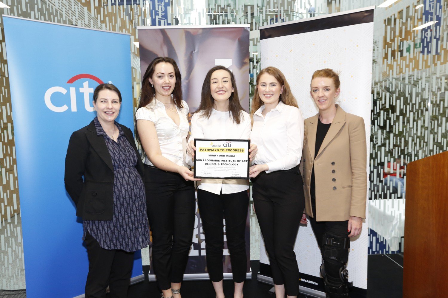 Laura Dennehy Country Manager of Enactus Ireland and Emma Hynes Head of Public Affairs from Citi Ireland presenting the students with their certificate